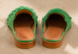 Green leather mule with fringe