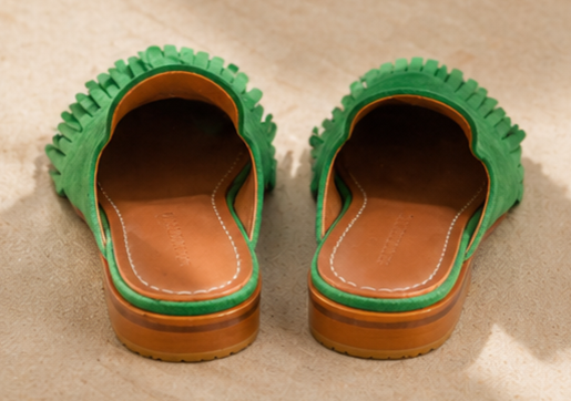 Green leather mule with fringe