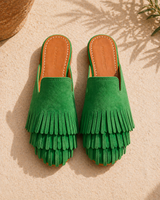 Green leather mule with fringe