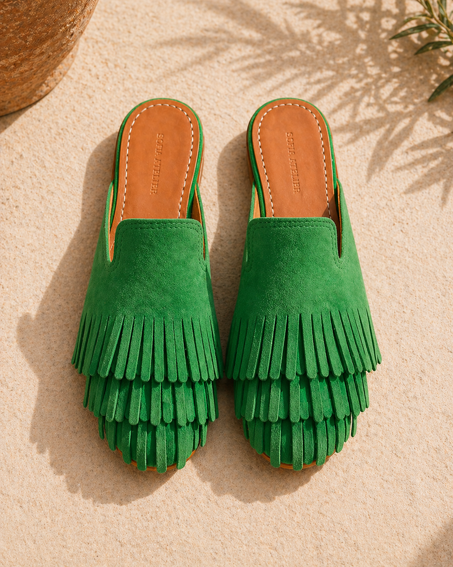Green leather mule with fringe