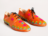 Orange and handwoven raffia derby shoe with raffia