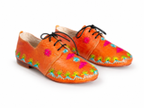 Orange and handwoven raffia derby shoe with raffia