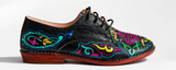 Black full-grain leather derby shoe hand-painted