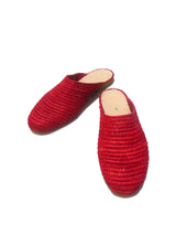 Designer leather and handwoven raffia mule with raffia