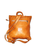 Minimalist goat leather roll-top backpack