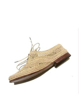 Naturalist leather and handwoven raffia derby shoe with raffia