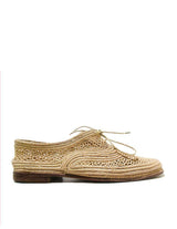 Naturalist leather and handwoven raffia derby shoe with raffia