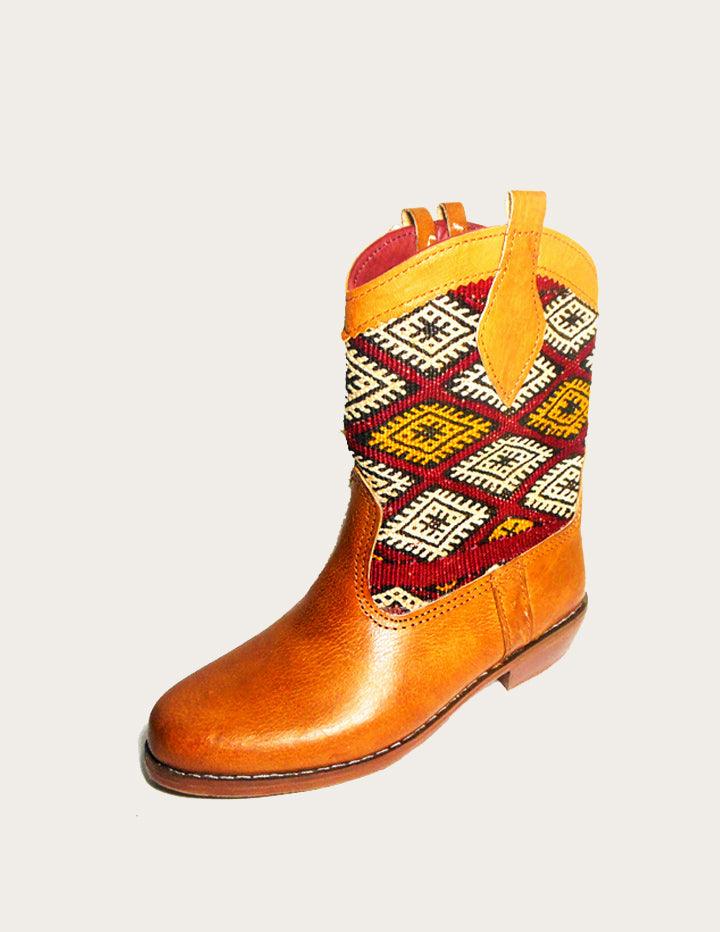 Brown Western Boot Styled With Vintage Kilim Rug - Slow Chic Fashion