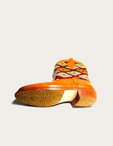 Brown and vintage kilim western boot with kilim