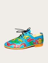 Hand-painted leather and handwoven raffia derby shoe with raffia