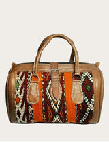 Leather and vintage kilim weekender bag with kilim