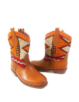 Leather and vintage kilim boot with kilim