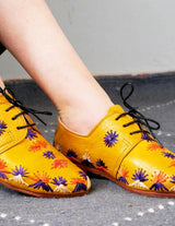 Yellow and handwoven raffia derby shoe with raffia
