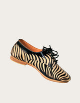 Black leather oxford shoe striped