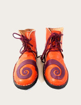 Genuine leather ankle boot with spiral motif