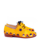 Yellow and handwoven raffia derby shoe with raffia