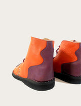 Genuine leather ankle boot with spiral motif