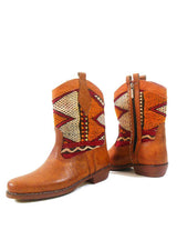 Leather and vintage kilim boot with kilim