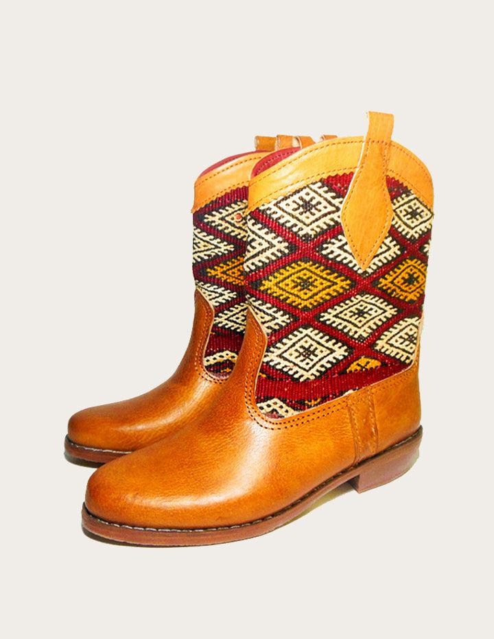Brown Western Boot Styled With Vintage Kilim Rug - Slow Chic Fashion