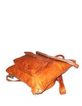 Minimalist goat leather roll-top backpack